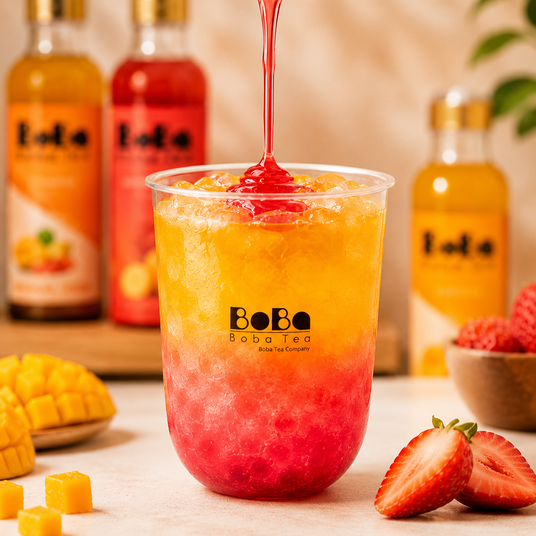 Boba Tea Company juice syrups poured into a fresh fruit bubble tea