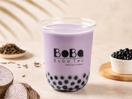 Taro milk tea bubble tea in a clear cup with tapioca pearls — Boba Tea Company