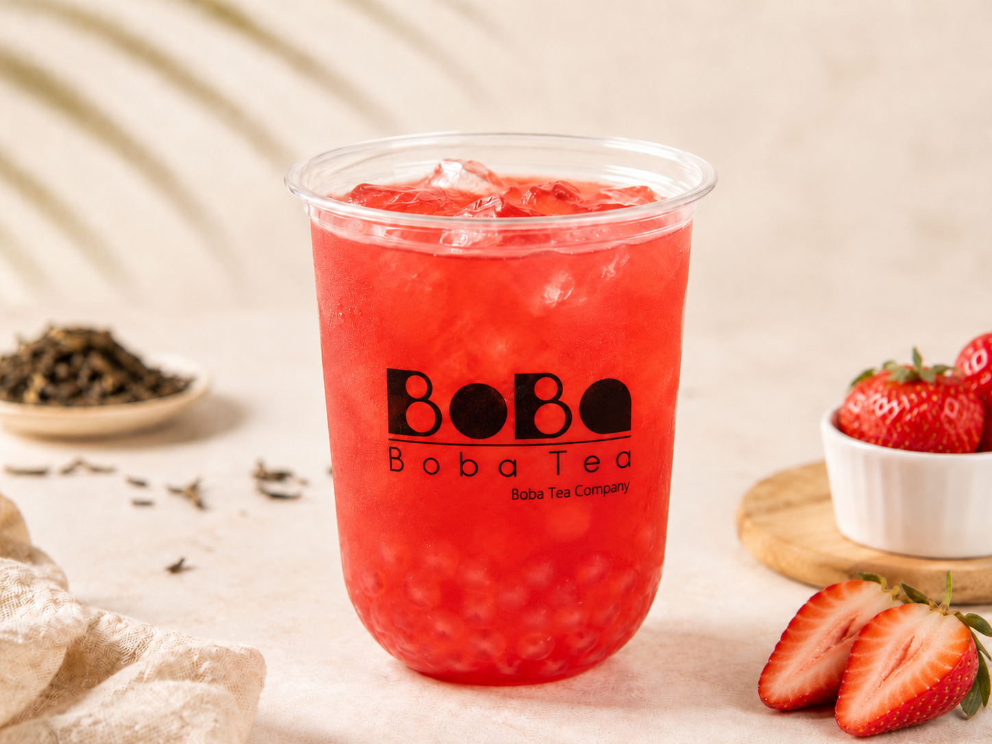 Strawberry fruit tea bubble tea in a clear cup with popping boba — Boba Tea Company