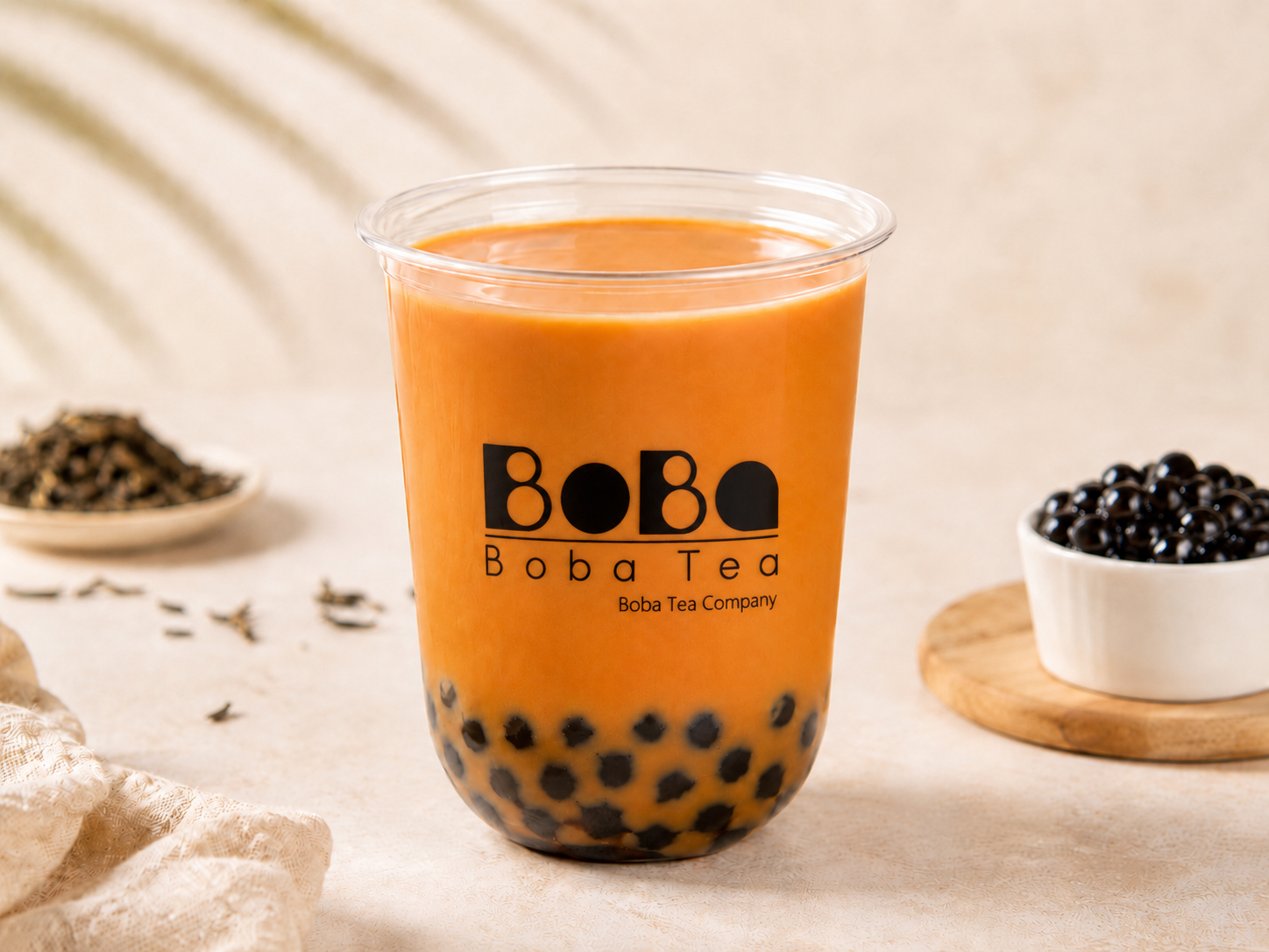 Thai milk tea bubble tea in a clear cup with tapioca pearls — Boba Tea Company