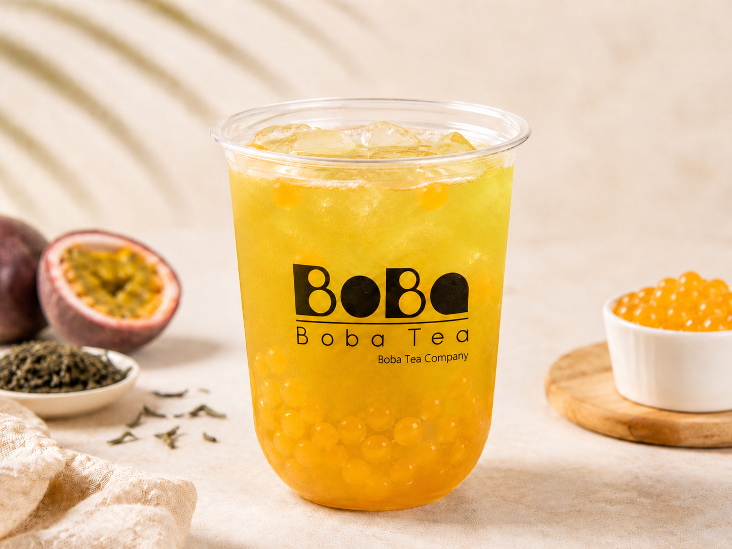 Passion fruit green tea bubble tea in a clear cup with popping boba — Boba Tea Company